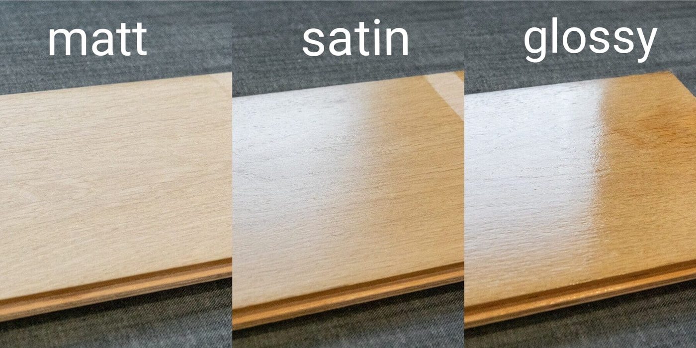 Three coated wood samples shown side by side comparing matt, satin and glossy sheen levels under the same lighting