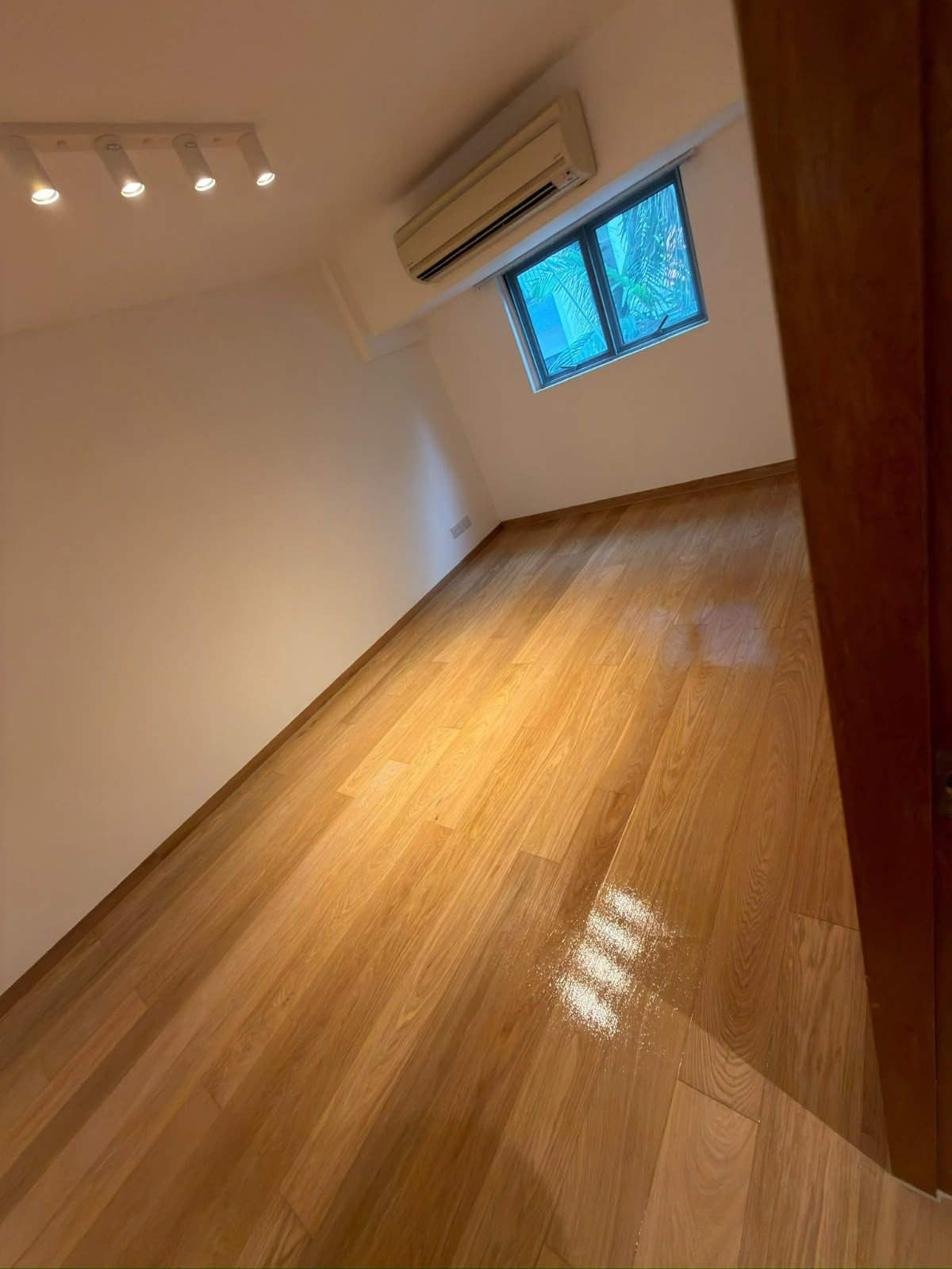 Angled view of the oak floor at Seraya Lane